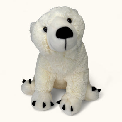 Plush polar bear toy on a white background