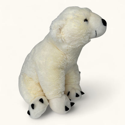Plush toy polar bear on a white background