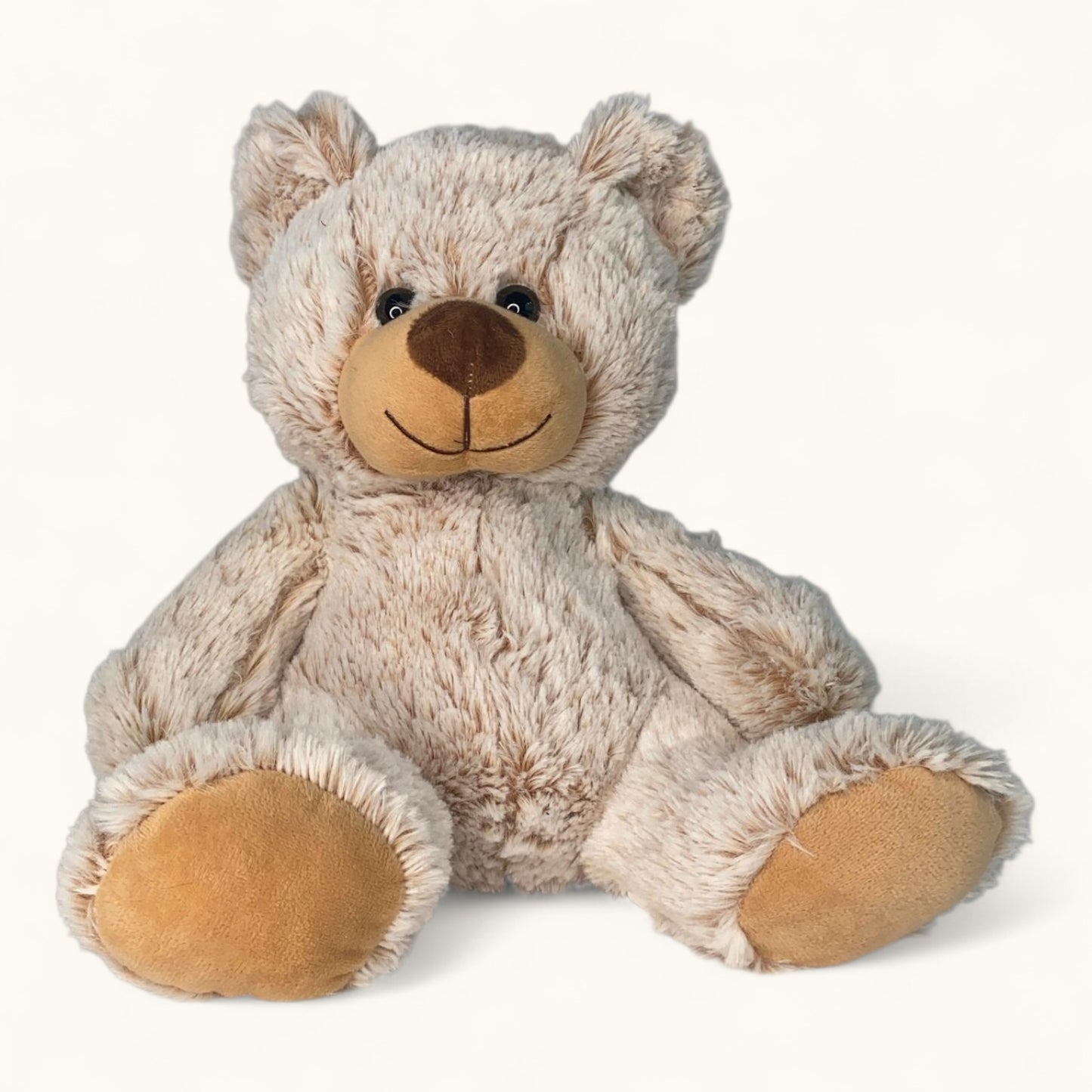 Plush teddy bear with a soft texture on a white background