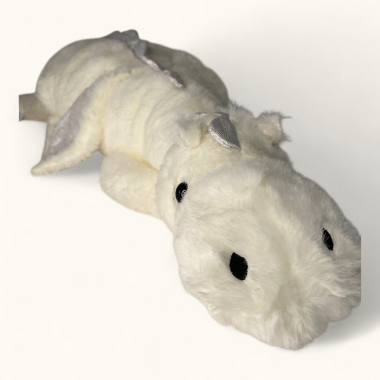 Plush toy resembling a white creature with gray wings on a white background