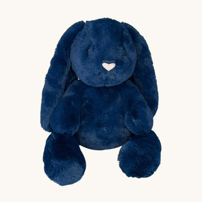 Blue plush bunny toy on a white background