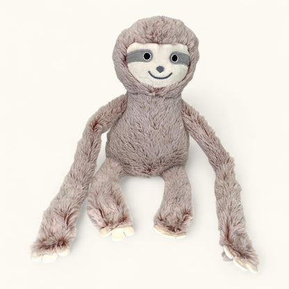 Plush toy sloth on a white background