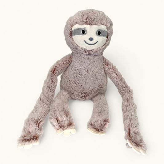 Plush toy sloth on a white background