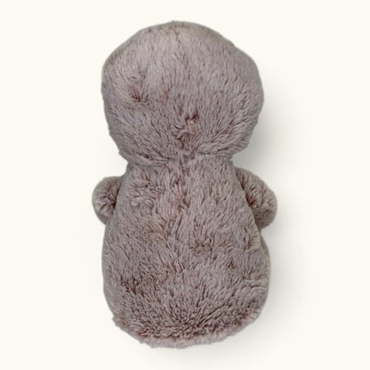 Plush toy sloth on a white background