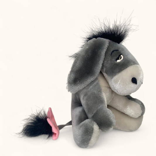Plush donkey toy on a white background