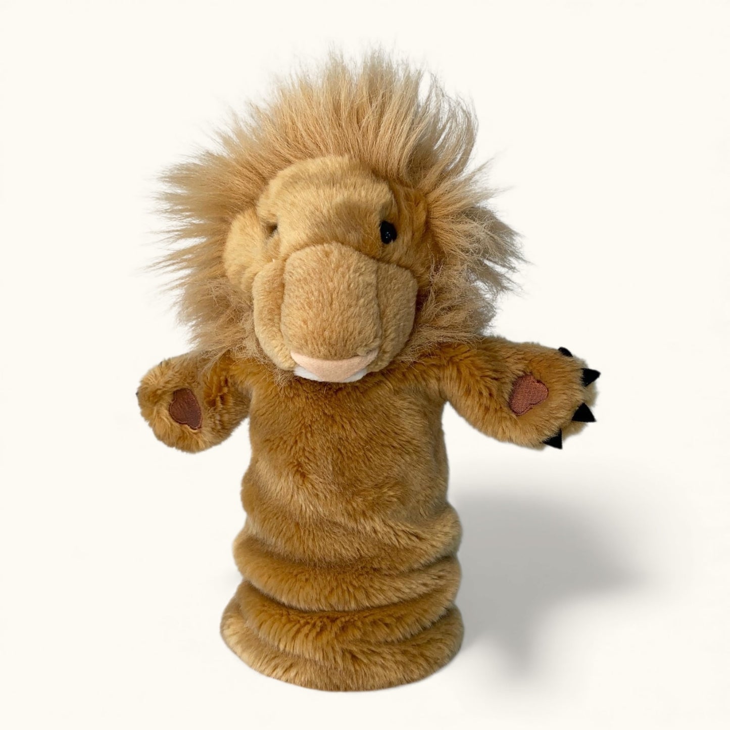 Plush lion toy on a white background