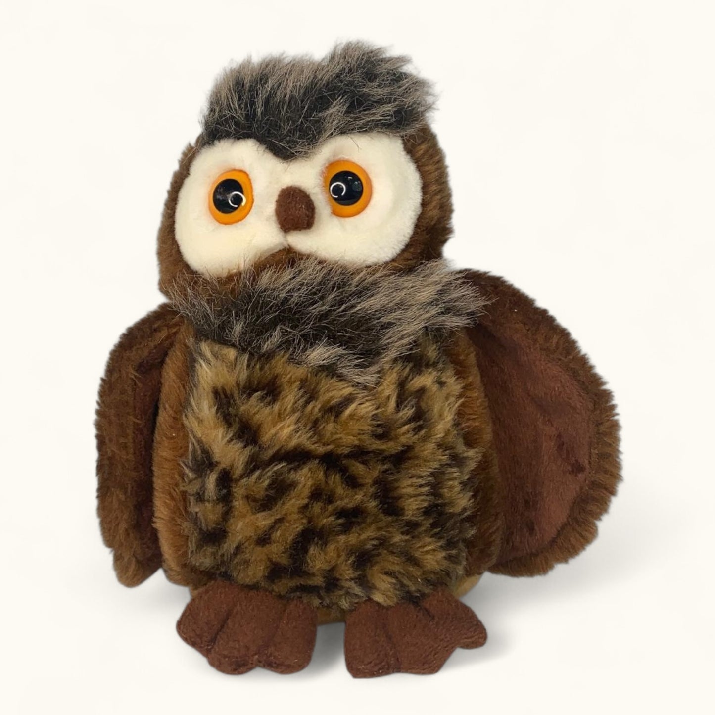 Plush owl toy with brown and black feathers on a white background