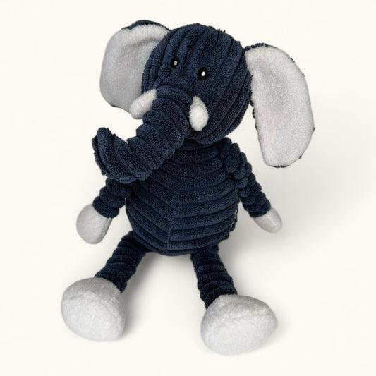 Plush toy elephant with a navy blue sweater on a white background