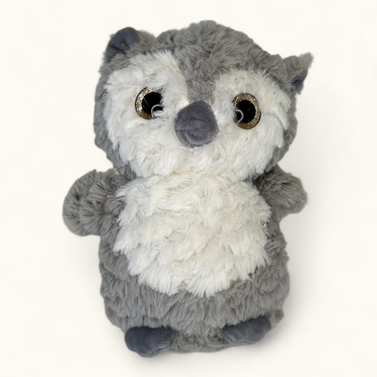 Plush toy resembling an owl on a white background