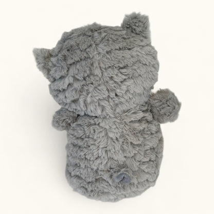 Gray plush toy resembling an owl on a white background