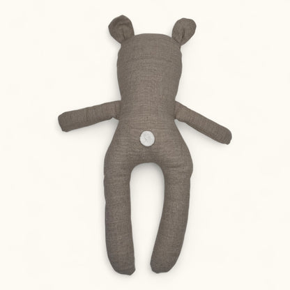 Brown teddy bear plush toy on a white background