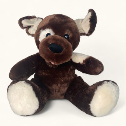 Brown plush toy with white accents on a white background