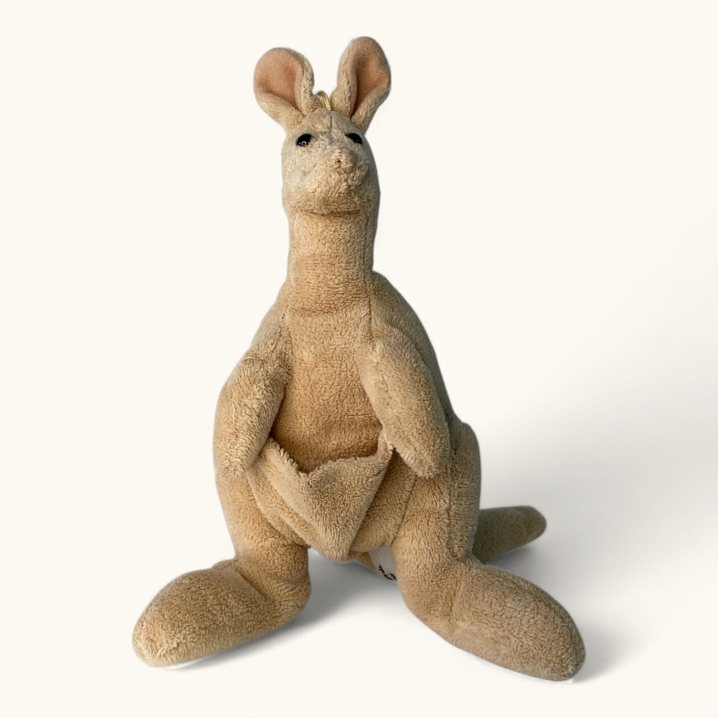 Plush kangaroo toy on a white background