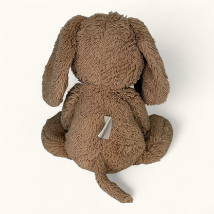 Brown plush bunny toy on a white background
