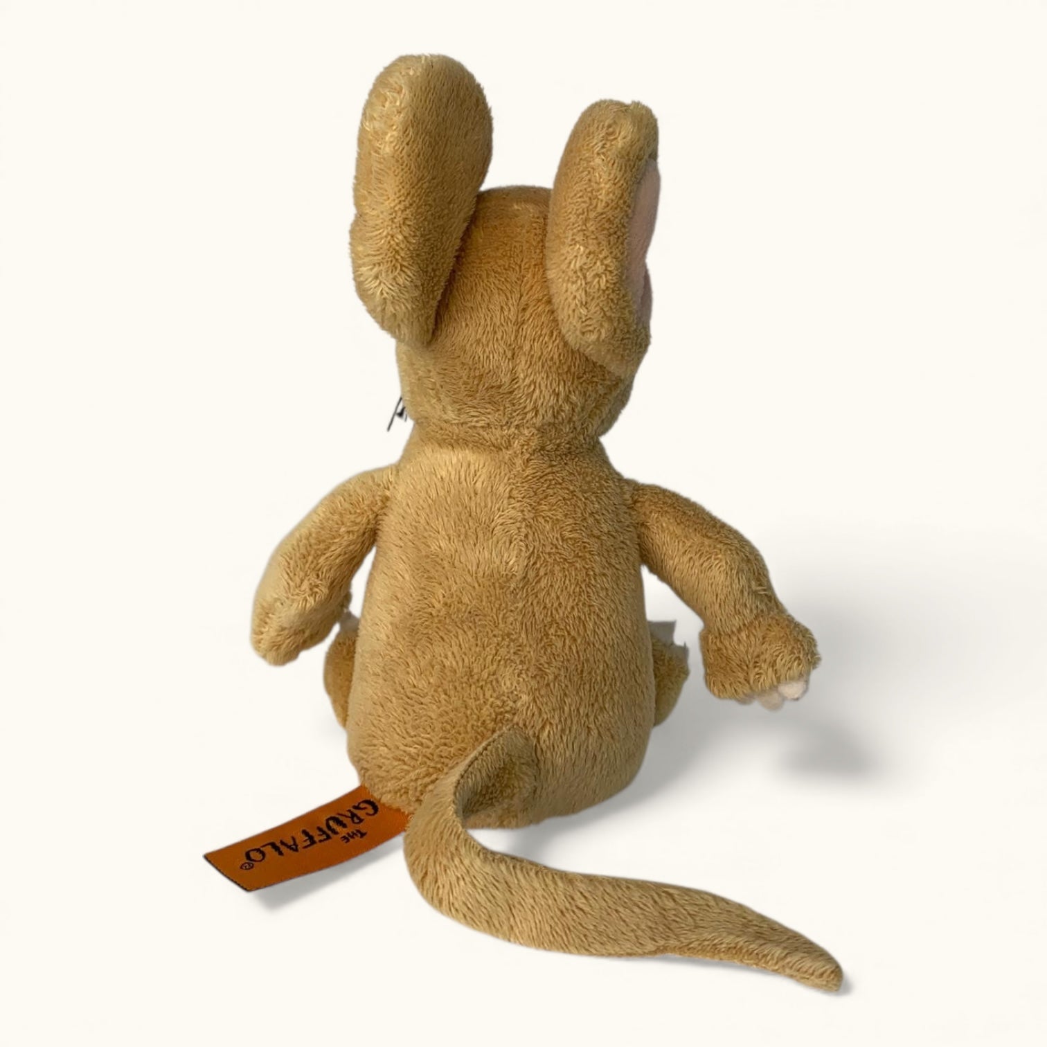 Brown plush mouse toy with a visible brand tag on a white background