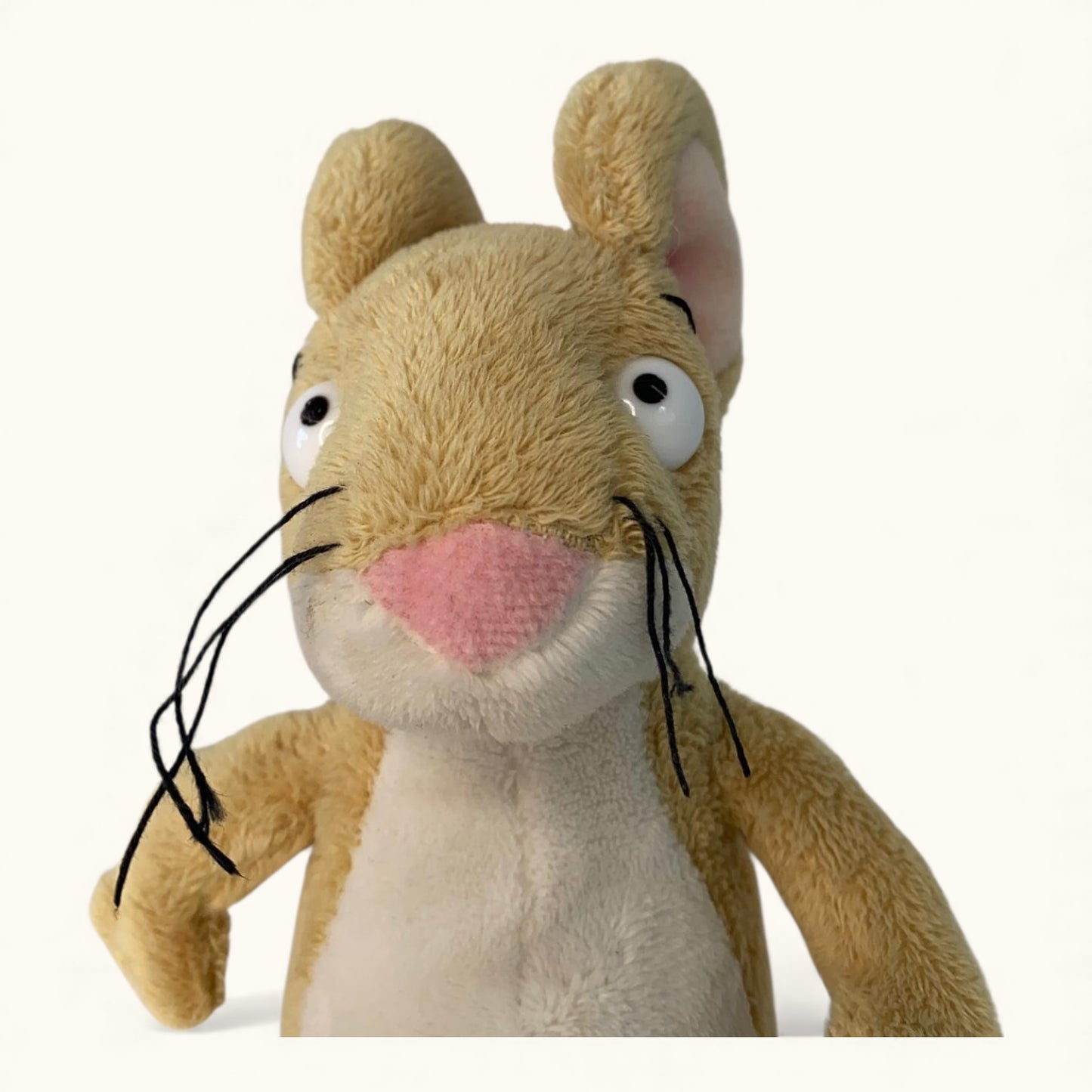 Plush toy mouse with a pink nose on a white background