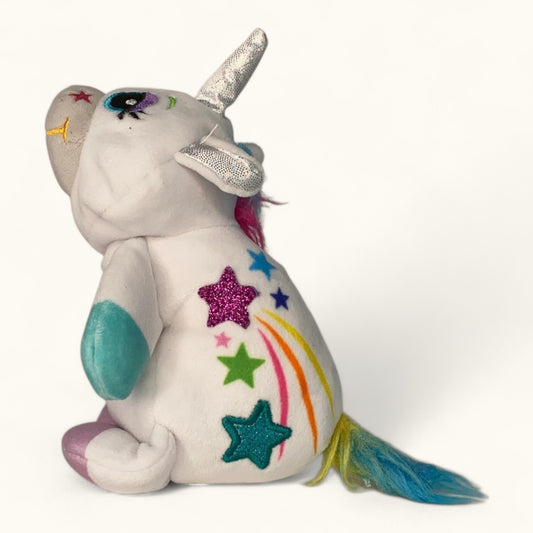 Plush toy unicorn horn and rainbow colors on a white background