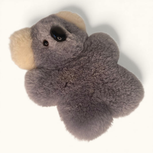 Plush toy koala on a white background