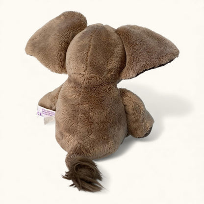 Plush elephant toy on a white background