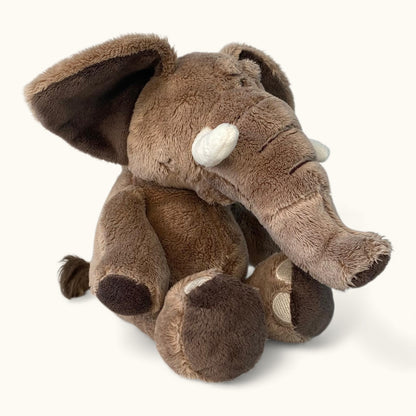 Plush elephant toy on a white background