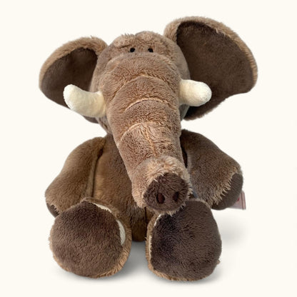 Plush elephant toy with brown fur and white tusks on a white background