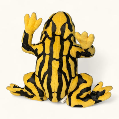 Plush toy frog with black and yellow pattern on a white background