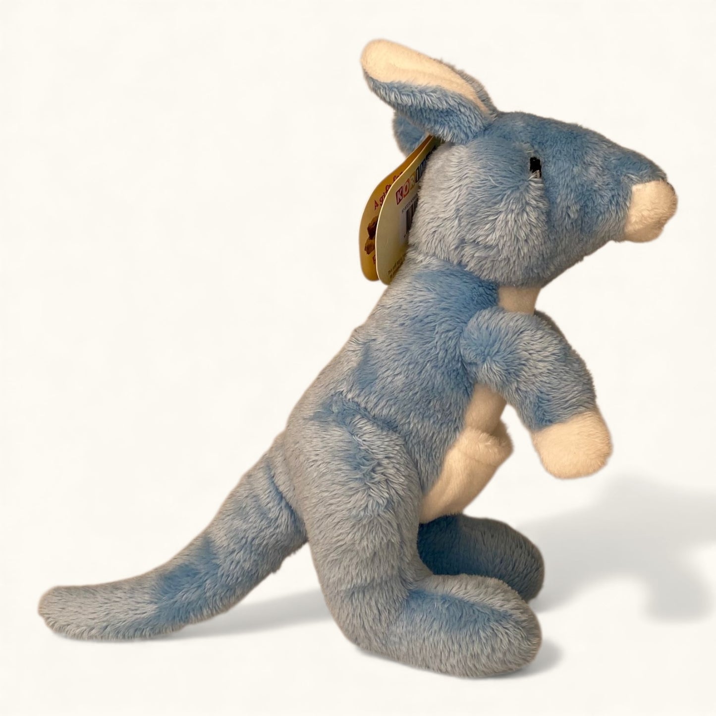 Plush toy kangaroo on a white background