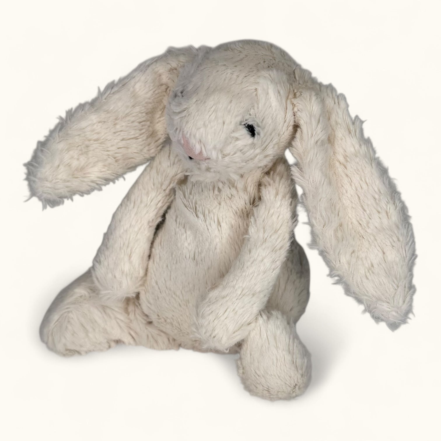 Plush toy rabbit on a white background