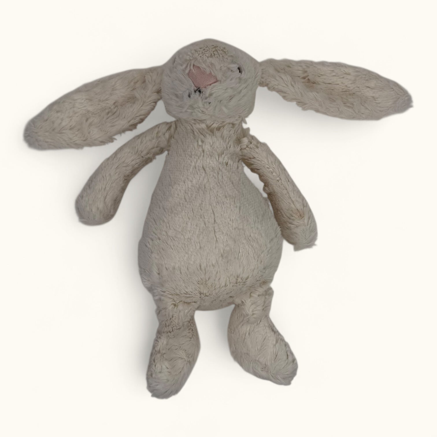Plush toy rabbit on a white background