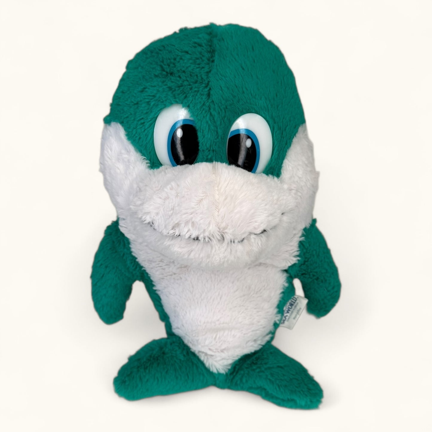 Plush toy with green and white colors on a white background