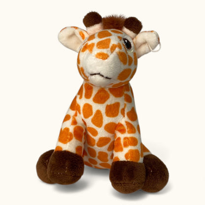 Plush giraffe toy with orange spots and brown accents on a white background