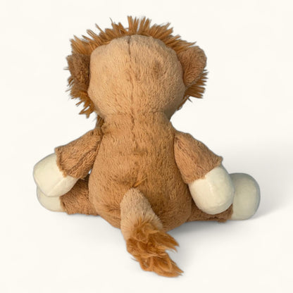 Plush lion toy on a white background