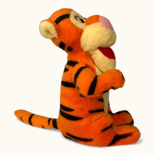 Plush toy of a tiger character on a white background