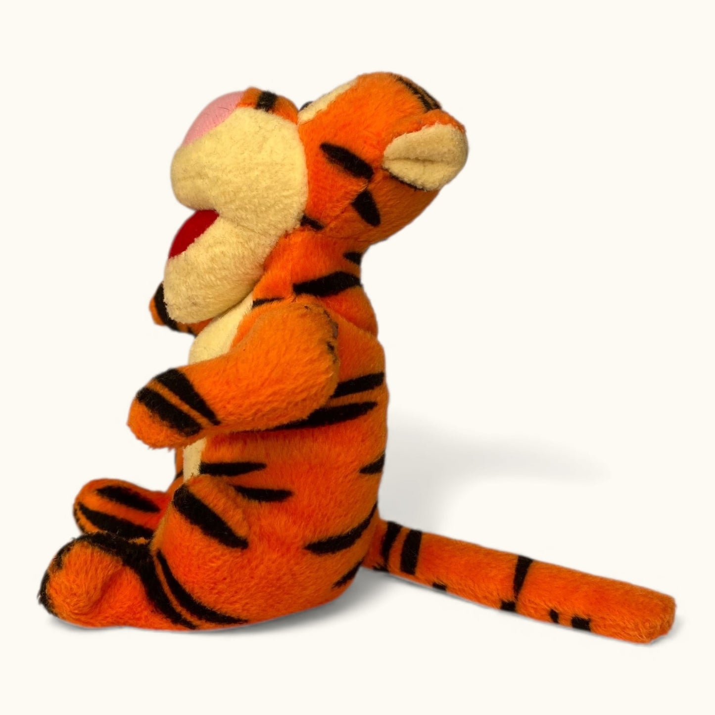Plush toy of a tiger character on a white background