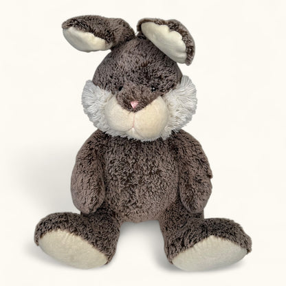 Plush toy rabbit with brown fur and white accents on a white background