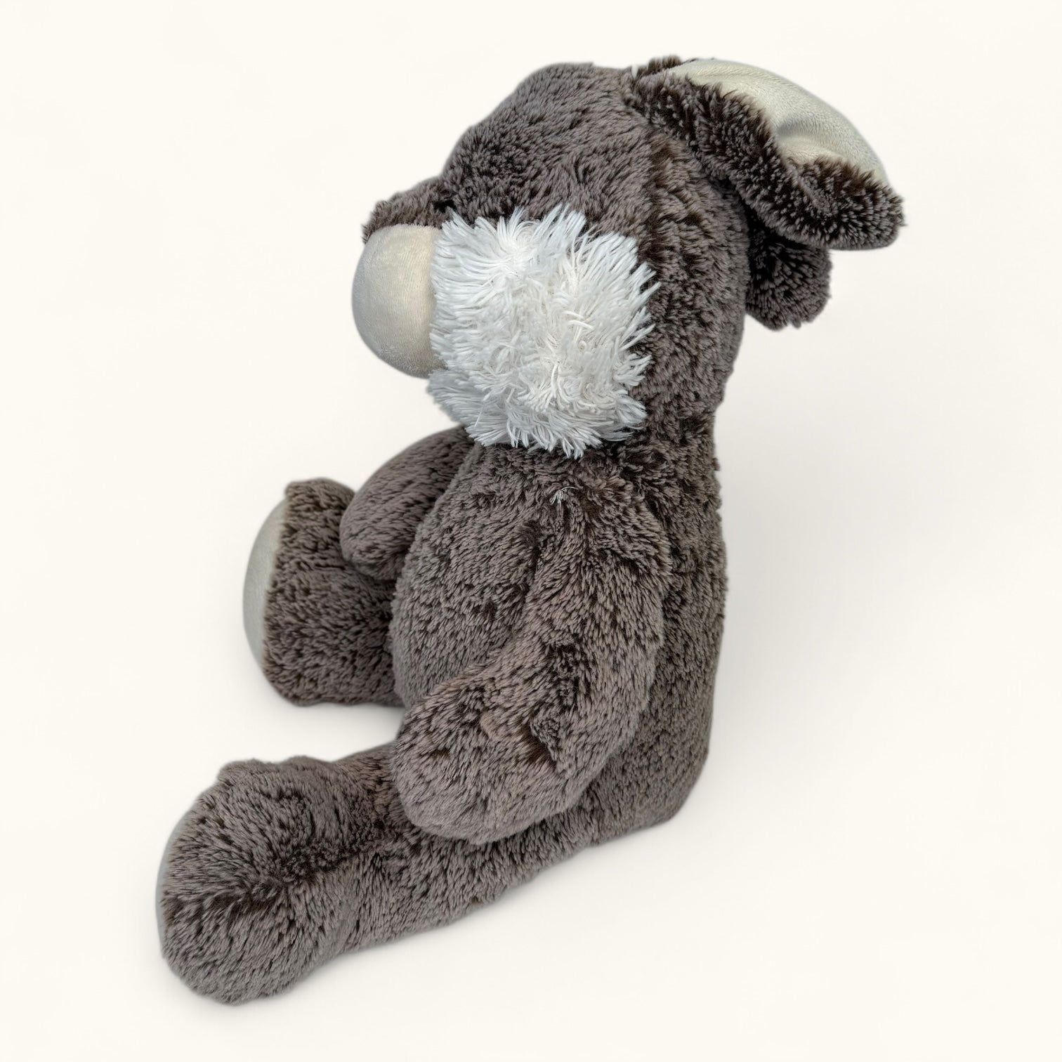 Plush donkey toy on a white background