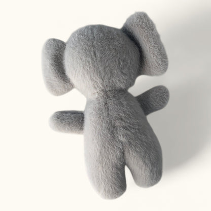 Gray plush toy koala on a white background